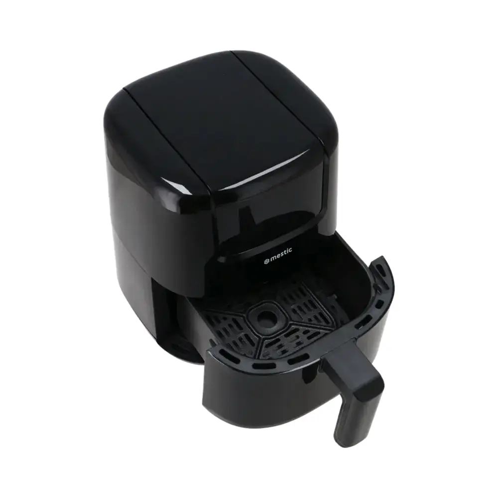 mestic-airfryer-ma-300-korb-geoeffnet-von-oben Mestic Airfryer MA-300 schräg von oben mit geöffneter Schublade und Gittereinsatz